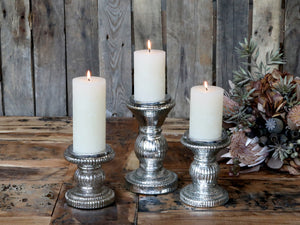 Candlestick with grooves for a pillar candle (Candle included)